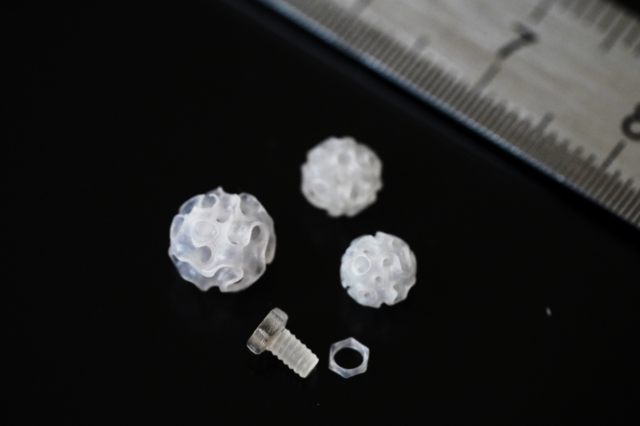 Printed structures using READYPCL INX including a functioning nut and bolt, printed on the Readily3D Tomolite v2.0